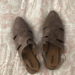 Mule with heel strap